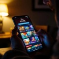 A person is sitting comfortably while using a smartphone to browse various online casino games, with enticing bonus funds displayed prominently on the screen, including options for deposit bonuses and free spins. The interface showcases specific slot games and promotional offers, inviting users to start playing and win real money.