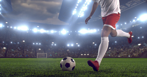 football player about to kick ball