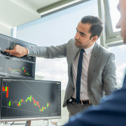 Men trading stocks