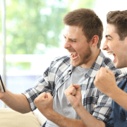 friends celebrate win