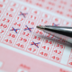 lottery ticket with pen