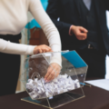 woman turning lottery wheel