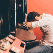 man losing at slots