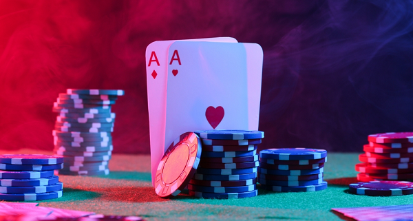 poker table, two aces and poker chips