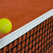 tennis-ball-gliding-over-net