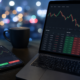 trading on laptop and phone